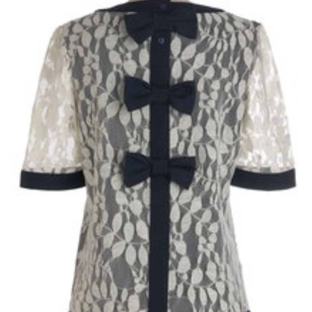 Anthropologie brand  Comme Toi -Elegant Lace Bow-Accent Top